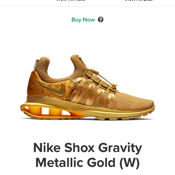 nike shox gravity metallic gold